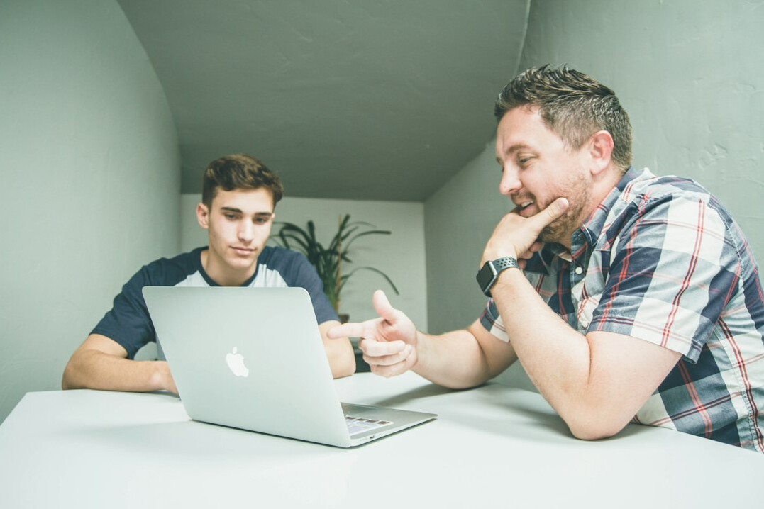 mentor helping adult student