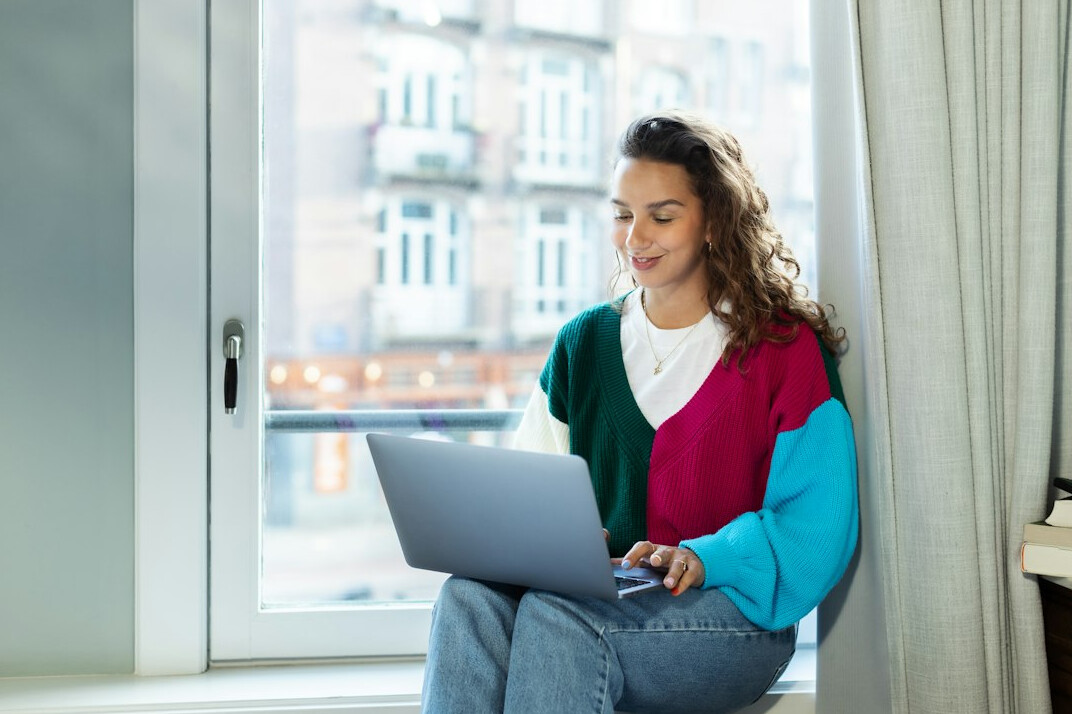 woman coding at home