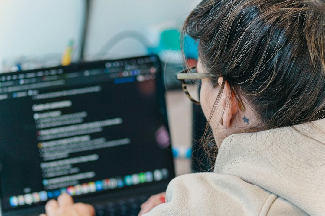 group of adults in coding class